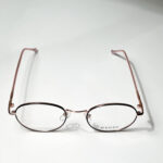 نظارة دائرية باللون الوردي